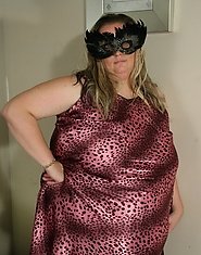 Big masked mama getting ready to be kinky