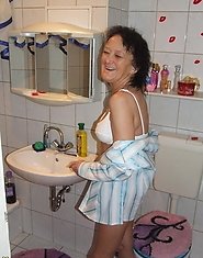 mature slut caught changing clothes in the bathroom